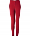 A vibrant hue and a curve-hugging cut lend these ruby red Schumacher skinny trousers their stylish, statement-making appeal - Especially flattering, thanks to a touch of stretch - On-trend, higher-rise, ultra slim cut - Slim tab waist and zip fly - Slash pockets at sides, welt pockets at rear - Decorative seams at rear elongate the leg - Chic, ankle-zip embellishment - Pair with a blazer, button down and ballet flats by day, or dress up with a silk blouse, leather jacket and platform pumps at night
