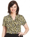 Brighten up your neutral bottoms with Alfani's short sleeve plus size top, broadcasting a lively print.