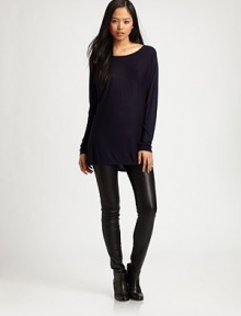 Collarbone-skimming top has dramatic dolman sleeves and a trendy hi-low hem. BoatneckDropped shouldersLong dolman sleevesHi-low hem hits below the hipsViscoseDry cleanImportedModel shown is 5'10 (177cm) wearing US size Small. Collarbone-skimming top has dramatic dolman sleeves and a trendy hi-low hem. BoatneckDropped shouldersLong dolman sleevesHi-low hem hits below the hipsViscoseDry cleanImportedModel shown is 5'10 (177cm) wearing US size Small.