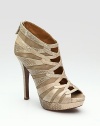 Soft suede and metallic snake-print leather weave across the front of the foot concluding with a peep toe. Self-covered heel, 5 (125mm) Covered platform, 1 (25mm) Compares to a 4 heel (100mm) Suede and snake-print leather upper Leather lining Rubber sole Padded insole ImportedOUR FIT MODEL RECOMMENDS ordering true size. 