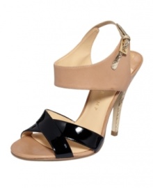 Sultry sophistication. Patent leather and python embossing take the Meade evening sandals by Ivanka Trump into undiscovered territory. Sultry sophistication. Patent leather and python embossing take the Meade evening sandals by Ivanka Trump into undiscovered territory.