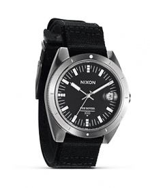 Solid with a surplus inspired design, this watch from Nixon flaunts a commanding look with performance-upping features like three-hand movement, durable canvas strap, and superfine markers. Solid with a surplus inspired design, this watch from Nixon flaunts a commanding look with performance-upping features like three-hand movement, durable canvas strap, and superfine markers.