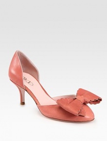 Scalloped bow and kitten heel sweeten this classic lambskin look. Self-covered heel, 2 (50mm)Leather upperLeather lining and solePadded insoleMade in ItalyOUR FIT MODEL RECOMMENDS ordering true size. 