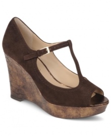 As dazzling as the desert they're named after. The sweet t-strap of Franco Sarto's Sahara platform wedges is paired down by a rustic platform heel. As dazzling as the desert they're named after. The sweet t-strap of Franco Sarto's Sahara platform wedges is paired down by a rustic platform heel.