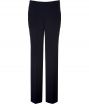 Luxe trousers made of fine, dark blue synthetic fiber - Modern silhouette with wide flared leg - Leg-lengthening, flattering pleats - Side concealed zipper closure - Classic style for the office, leisure or evening - Style with blouses, cardigans and heels for endless wardrobe options