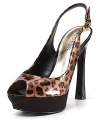 Patent platforms take sultry style to new heights with a provocative peeptoe and notice-me heel. By GUESS.