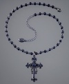 Mysterious and sexy, this mixed metal black hematite cross necklace by GUESS is a gorgeous accessory for day or night. Approximate length: 15 inches + 3-inch extender. Approximate drop: 2-1/2 inches.