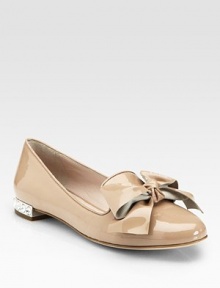 Glossy patent leather in an easy shape, topped with a bow and jewel-embellished heel. Patent leather upperLeather lining and solePadded insoleImportedOUR FIT MODEL RECOMMENDS ordering one half size up as this style runs small. Glossy patent leather in an easy shape, topped with a bow and jewel-embellished heel. Patent leather upperLeather lining and solePadded insoleImportedOUR FIT MODEL RECOMMENDS ordering one half size up as this style runs small.