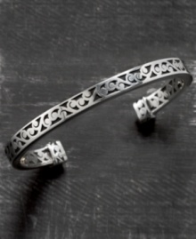With modern vine-like openwork and beautiful lines, this Lois Hill sterling silver cuff bangle bracelet adds a subtle touch of artistry to your every day look. Approximate diameter: 2-1/4 inches. With modern vine-like openwork and beautiful lines, this Lois Hill sterling silver cuff bangle bracelet adds a subtle touch of artistry to your every day look. Approximate diameter: 2-1/4 inches.