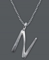 The perfect personalized gift. A polished sterling silver pendant features the letter N with a chic asymmetrical shape. Comes with a matching chain. Approximate length: 18 inches. Approximate drop: 3/4 inch.