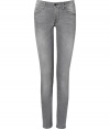 These classic skinny jeans from Seven for All Mankind lend effortless style to any casual ensemble - Five-pocket styling, distinctive logo detail on back pockets - Slim fit, skinny leg - Pair with a tunic top, printed tee, or silk blouse and heels