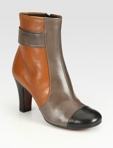 Seasonal staple of rich paneled leather with a chunky heel and timeless cap toe. Self-covered heel, 3½ (90mm)Leather upperSide zipLeather liningLeather sole with a rubber insertPadded insoleMade in Spain Seasonal staple of rich paneled leather with a chunky heel and timeless cap toe. Self-covered heel, 3½ (90mm)Leather upperSide zipLeather liningLeather sole with a rubber insertPadded insoleMade in Spain