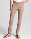 These cropped Vince khaki pants are the smartest of staples. Rendered in a stretch cotton, the slim silhouette boasts a curve-hugging fit for a sleek finish.