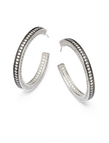 THE LOOKHoop silhouetteInset cubic zirconia accentsBlack rhodium-plated sterling silver settingPost backTHE MEASUREMENTLength, about 1.5ORIGINImported THE LOOKHoop silhouetteInset cubic zirconia accentsBlack rhodium-plated sterling silver settingPost backTHE MEASUREMENTLength, about 1.5ORIGINImported