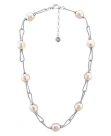 Polish your look with simple elegance. Majorica necklace features Baroque, organic, man-made pearls (14 mm) in a fluid sterling silver setting. Approximate length: 17 inches + 2-inch extender. Polish your look with simple elegance. Majorica necklace features Baroque, organic, man-made pearls (14 mm) in a fluid sterling silver setting. Approximate length: 17 inches + 2-inch extender.
