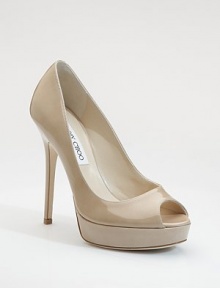 Sophisticated patent leather staple with peep toe and platform for extra comfort.Self-covered heel, 5¼ (130mm) Self-covered platform, 1¼ (30mm) Compares to a 4 heel (100mm) Peep toe Leather lining and sole Padded insole ImportedOUR FIT MODEL RECOMMENDS ordering true size. Sophisticated patent leather staple with peep toe and platform for extra comfort.Self-covered heel, 5¼ (130mm) Self-covered platform, 1¼ (30mm) Compares to a 4 heel (100mm) Peep toe Leather lining and sole Padded insole ImportedOUR FIT MODEL RECOMMENDS ordering true size.