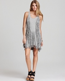 This bohemian-chic Sauce dress flaunts allover fringe for lively movement on the dance floor and beyond. This bohemian-chic Sauce dress flaunts allover fringe for lively movement on the dance floor and beyond.