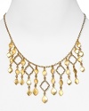 Gleaming gold jewels are key this season, and Lauren by Ralph Lauren's illusion necklace makes a subtle, sophisticated nod to the trend.