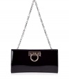 Inimitable Italian craftsmanship meets classic elegance with Salvatore Ferragamos luxurious patent leather Norina clutch - Traditional envelope shape with a detachable chain link handle and silver Gancio bit accent - Magnetic closure and satin lining - Single interior open pocket - Perfect for parties and cocktails and roomy enough to fit all of the evening essentials - Height: 4.75 - Width: 9 - Depth: 1.25 - Made in Italy