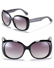 Oversized rounded cat eye sunglasses with metallic heart embellished arms from MARC BY MARC JACOBS. What's not to love? Oversized rounded cat eye sunglasses with metallic heart embellished arms from MARC BY MARC JACOBS. What's not to love?