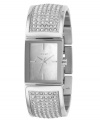 Knockout style by DKNY. This watch features a crystal-accented stainless steel half-bangle bracelet and rectangular stainless steel case. Mother-of-pearl dial with silvertone stick indices and logo. Quartz movement. Water resistant to 30 meters. Two-year limited warranty.