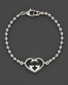 From the Love Britt collection, a beautifully-crafted sterling silver heart bracelet. Designed by Gucci.