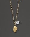 A gold leaf has a diamond accent and is paired with a diamond pavé medallion. Designed by Meira T.