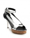 THE LOOKCutout strap metallic patent leather upperAdjustable ankle strap with buckleTHE FITManmade heel, 3½ (90mm)Cork platform, 1 (25mm)Compares to a 2½ heel (65mm)THE MATERIALLeather upperLeather sole and liningORIGINMade in Italy
