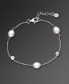 Featuring freshwater pearls (6-1/2 to 8 mm) and sparkling cubic zirconia accents (1/2 ct. t.w.) set in sterling silver, CRISLU's bracelet epitomizes understated elegance. Approximate length: 7 inches.