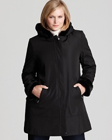 Plush faux fur lining lends supple warmth to this hooded A-line coat by Marc New York. Plush faux fur lining lends supple warmth to this hooded A-line coat by Marc New York.