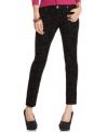 An intricate floral-print adds deep texture to these five-pocket-style skinny pants from Freestyle!