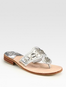 Sparkling jewels adorn this brilliant, metallic leather thong. Stacked heel, 1 (25mm) Leather lining and sole ImportedOUR FIT MODEL RECOMMENDS ordering true size.. 