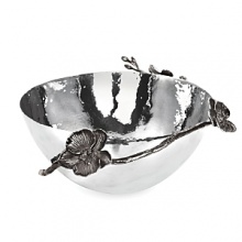 By interpreting plant forms in cast metal, Michael Aram presents work which is evocative of a natural environment transformed and redefined. Says the designer, There is a velvety luxury–an almost gothic quality – to representing orchids in blackened nickel. To me, the pieces feel seductive and graceful, yet dark and unexpected. By interpreting plant forms in cast metal, Michael Aram presents work which is evocative of a natural environment transformed and redefined. Says the designer, There is a velvety luxury–an almost gothic quality – to representing orchids in blackened nickel. To me, the pieces feel seductive and graceful, yet dark and unexpected.