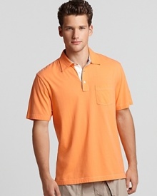A vivid orange polo from Michael Kors with a contrast three button placket--a comfy weekend essential. A vivid orange polo from Michael Kors with a contrast three button placket--a comfy weekend essential.