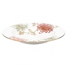 Painted Camellia brings vintage florals to life with just the right amount of color to make the dinner table unique. Draped against a gold-rimmed white canvas, delicate painted florals create a beautiful melodic feel. The salad plate, defined by a rich black background, is artfully juxtaposed to its white-bodied counterpart for a dramatic contrast. Painted Camellia brings vintage florals to life with just the right amount of color to make the dinner table unique. Draped against a gold-rimmed white canvas, delicate painted florals create a beautiful melodic feel. The salad plate, defined by a rich black background, is artfully juxtaposed to its white-bodied counterpart for a dramatic contrast.