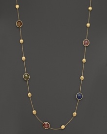 Mixed sapphires in colorful hues adorn this hand-engraved yellow gold station necklace from Marco Bicego. Mixed sapphires in colorful hues adorn this hand-engraved yellow gold station necklace from Marco Bicego.