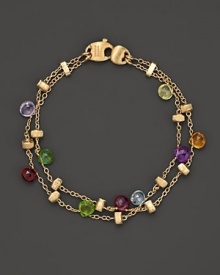 From the Paradise collection, a double stranded bracelet with semi precious stones, designed by Marco Bicego. From the Paradise collection, a double stranded bracelet with semi precious stones, designed by Marco Bicego.