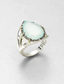 A faceted aqua chalcedony stone surrounded by dazzling white sapphires in a goldtone plated sterling silver setting. Aqua chalcedonyWhite sapphiresSterling silverGoldtone sterling silverWidth, about .8Imported