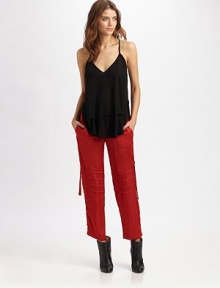 Beyond chic, a design with a feminine neckline and an innovative hem. Halter necklineSide slitsRuffle front, high-low hemAbout 33 from shoulder to hemTencelDry cleanImported Model shown is 5'10 (177cm) wearing US size Small. Beyond chic, a design with a feminine neckline and an innovative hem. Halter necklineSide slitsRuffle front, high-low hemAbout 33 from shoulder to hemTencelDry cleanImported Model shown is 5'10 (177cm) wearing US size Small.