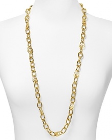 MICHAEL Michael Kors' classically styled gold chain is a striking complement to a neutral neckline. Slip it on with sumptuous knits to channel the label's enviable jet-set aesthetic. MICHAEL Michael Kors' classically styled gold chain is a striking complement to a neutral neckline. Slip it on with sumptuous knits to channel the label's enviable jet-set aesthetic.