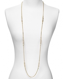 Channel this season's flair for the dramatic with MICHAEL Michael Kors' dangly necklace. Day or after dark, this delicate design brings a touch of sparkle. Channel this season's flair for the dramatic with MICHAEL Michael Kors' dangly necklace. Day or after dark, this delicate design brings a touch of sparkle.