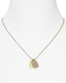 Let MICHAEL Michael Kors pavé dog tags brand an all-American look. This logo engraved design slips over basics and adds a touch of polish. Let MICHAEL Michael Kors pavé dog tags brand an all-American look. This logo engraved design slips over basics and adds a touch of polish.