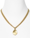 A gleaming hammered pendant finishes this multi-strand chain necklace from Lauren by Ralph Lauren.