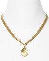 A gleaming hammered pendant finishes this multi-strand chain necklace from Lauren by Ralph Lauren.