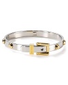 This classically styled Michael Kors bangle shines on in silver plated metal with gleaming studs.