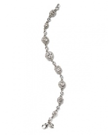 Your special occasion dress deserves an even more special bracelet. Here, from Carolee LUX, the geometric shaped crystal design makes your whole look sparkle.