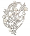 Climb the social ladder with this stylish vine pin from Carolee. Crafted from silver-tone mixed metal, glass pearls and accents add a lustrous touch. Approximate length: 2 inches.