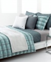 The Odum duvet cover set from Lacoste features an effortless plaid pattern in a mixture of moss green and smoky blue over ultra-comfortable cotton. Subtle lines of light rust run through the casual look, offering a coordinate with textured Lacoste bedding accents.