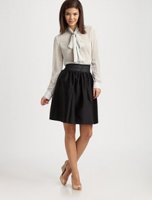A plethora of polka dots decorate this airy style with a feminine tie front and elegant pearl buttons.Self-tie collarLong sleevesConcealed button placketEngraved pearl buttons on placket and cuffsBack yokeAbout 25 from shoulder to hemPolyesterImportedDry clean Model shown is 5'9½ (176cm) wearing US size 4. A plethora of polka dots decorate this airy style with a feminine tie front and elegant pearl buttons.Self-tie collarLong sleevesConcealed button placketEngraved pearl buttons on placket and cuffsBack yokeAbout 25 from shoulder to hemPolyesterImportedDry clean Model shown is 5'9½ (176cm) wearing US size 4.