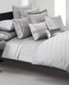 This Windsor Grey quilt from Hugo Boss turns your bed into an oasis of tranquility. 350-thread count cotton sateen and silk textures provide endless comfort.